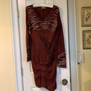 Very unusual knit dress. Deep rose/ pink/ white knitting on sleeves. Scoop neck